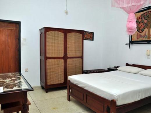 Ganga Garden Hotel เบอร์อูวาลา ห้อง รูปภาพ